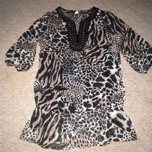 Feline brand cheetah animal print top with bead type detail at the neck